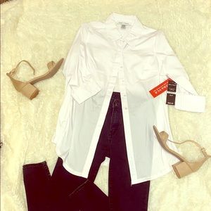 An educated, white button up shirt with collar